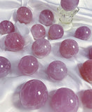 Purple rose quartz sphere